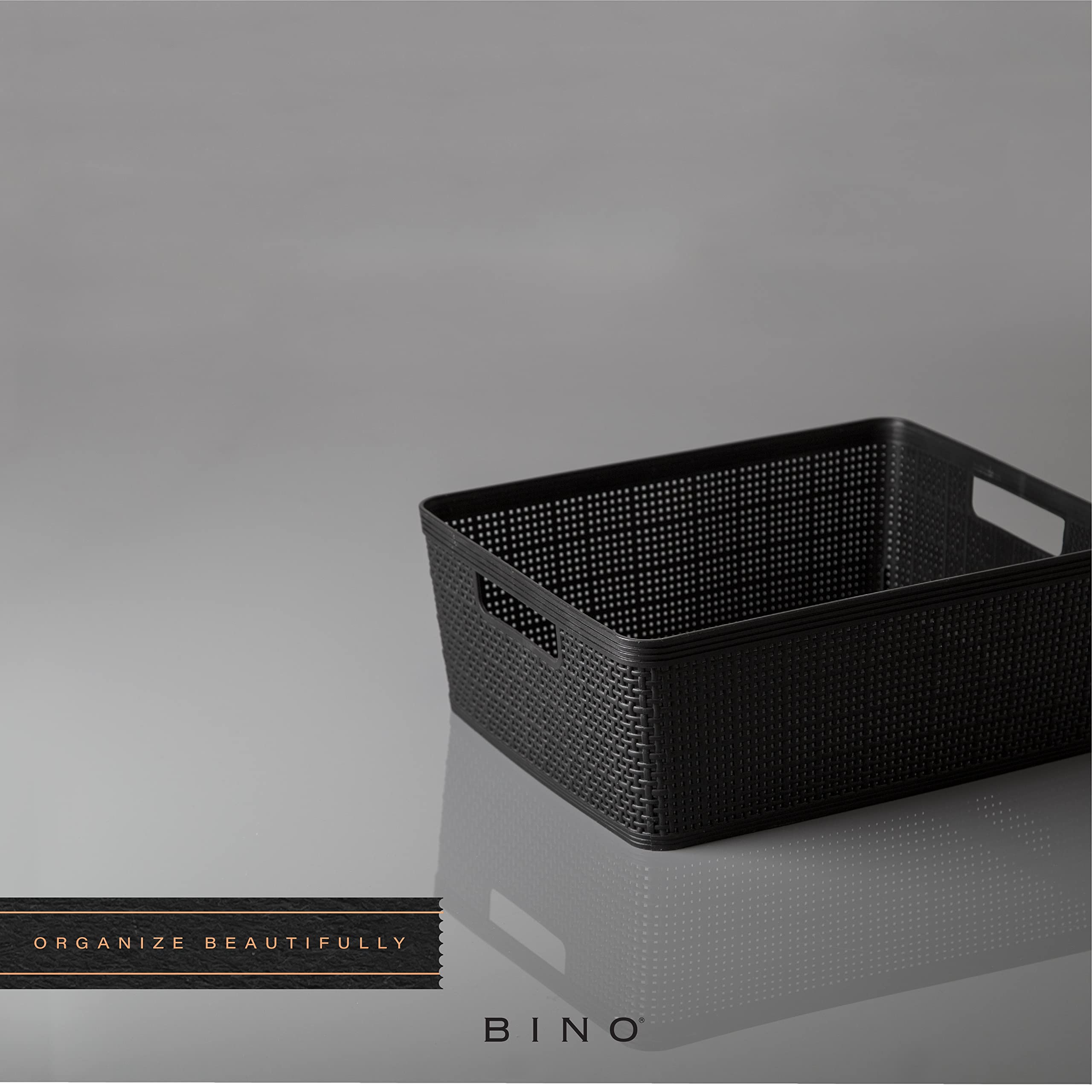 BINO woven plastic basket in black complements home decor