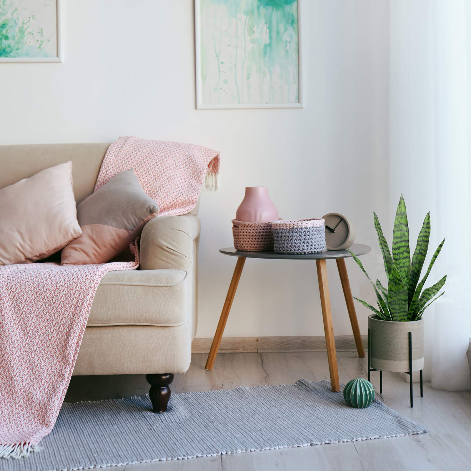 Bird Fiy faux agave and sansevieria detail highlights durable plastic construction.