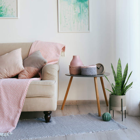Bird Fiy faux agave and sansevieria detail highlights durable plastic construction.