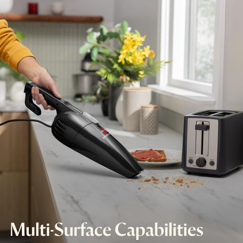 Bissell 2033M Featherweight hand-vacuum with crevice tool reaches tight gaps.