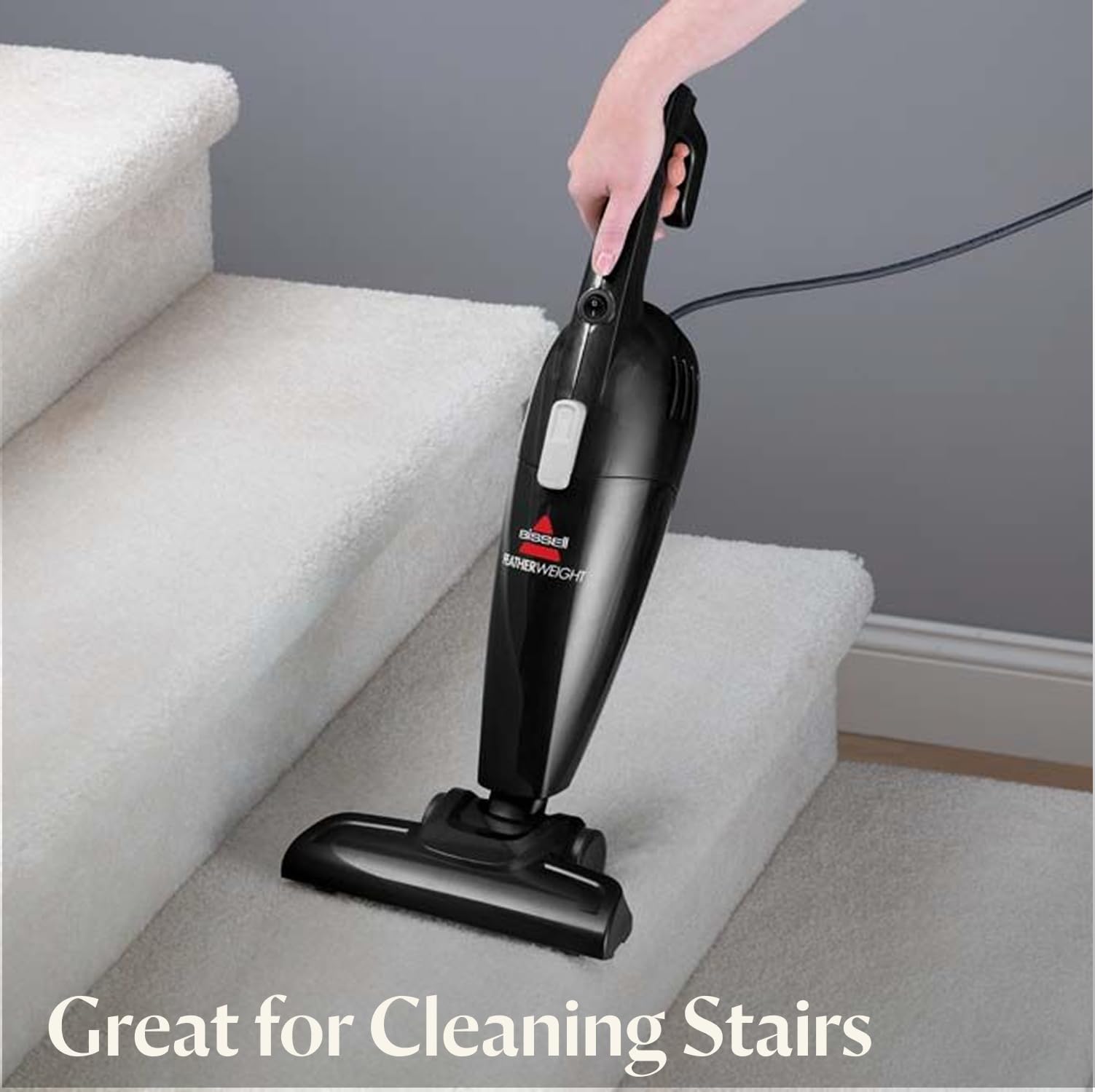 Bissell 2033M Featherweight on hard floor demonstrates efficient debris pickup.