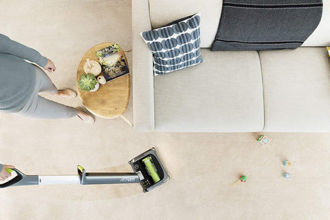 Bissell Air Ram cordless vacuum powered by 22V battery for fade-free suction.