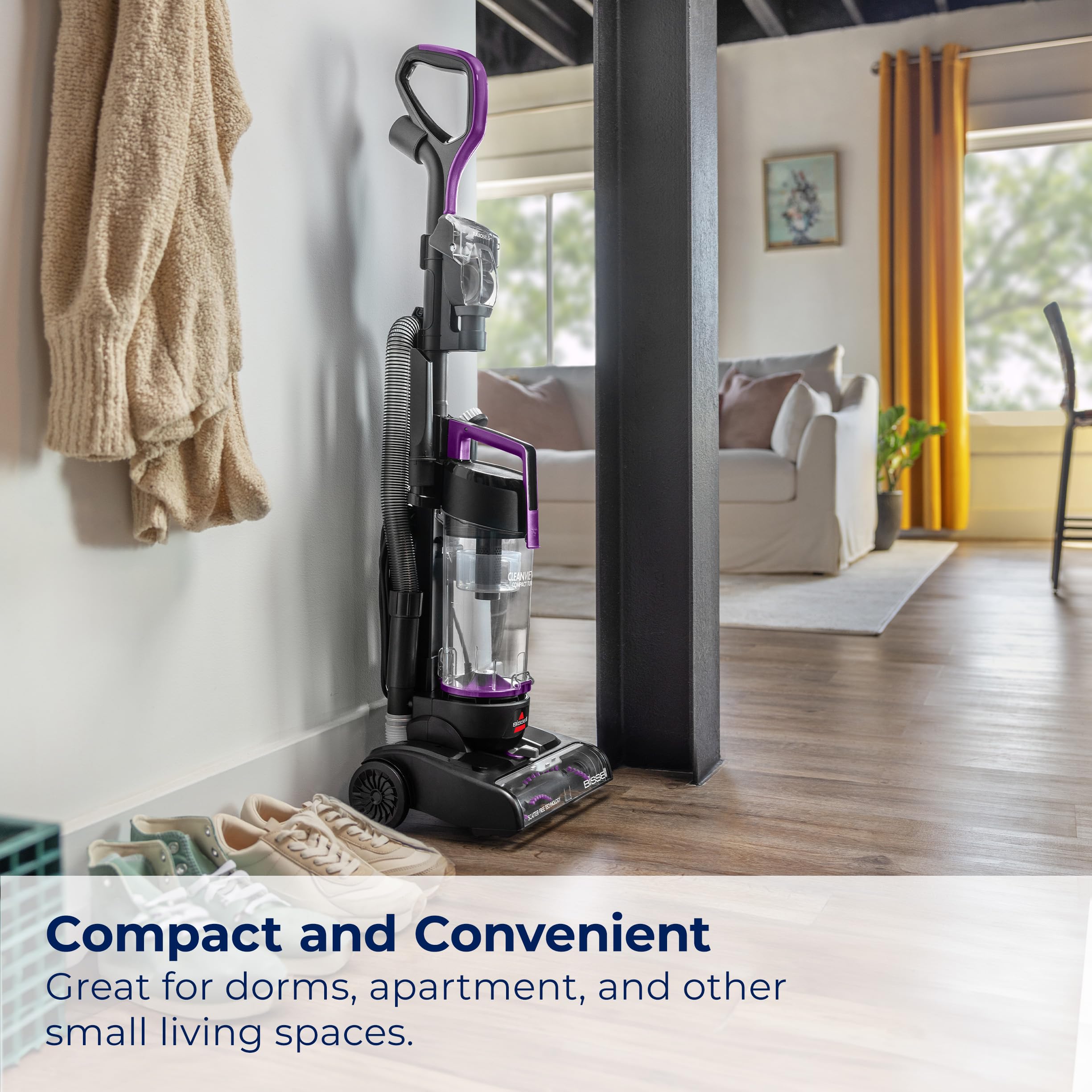 Bissell CleanView Compact Turbo on carpet shows powerful suction in action