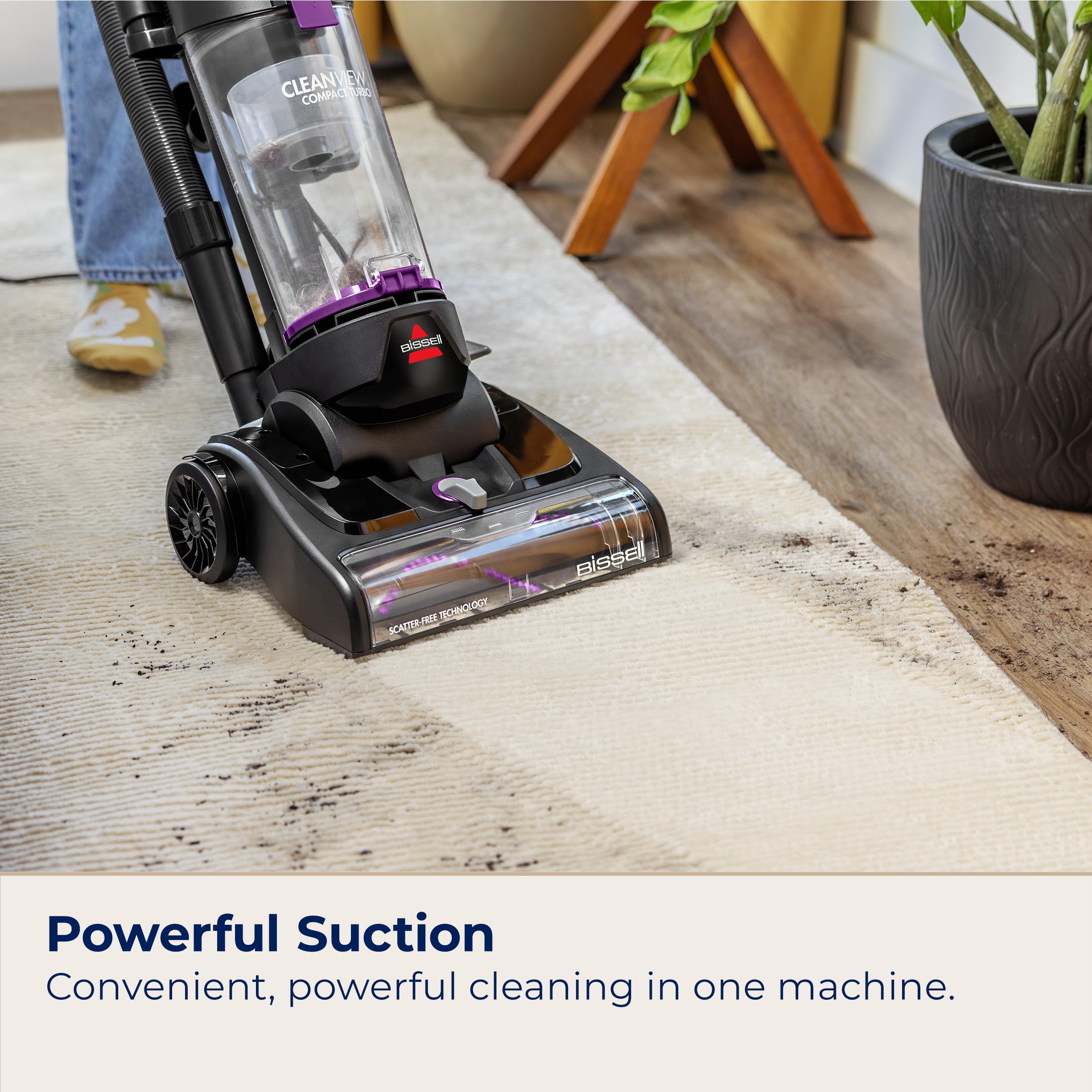 Bissell CleanView Compact Turbo wand extended in use for upholstery and curtains