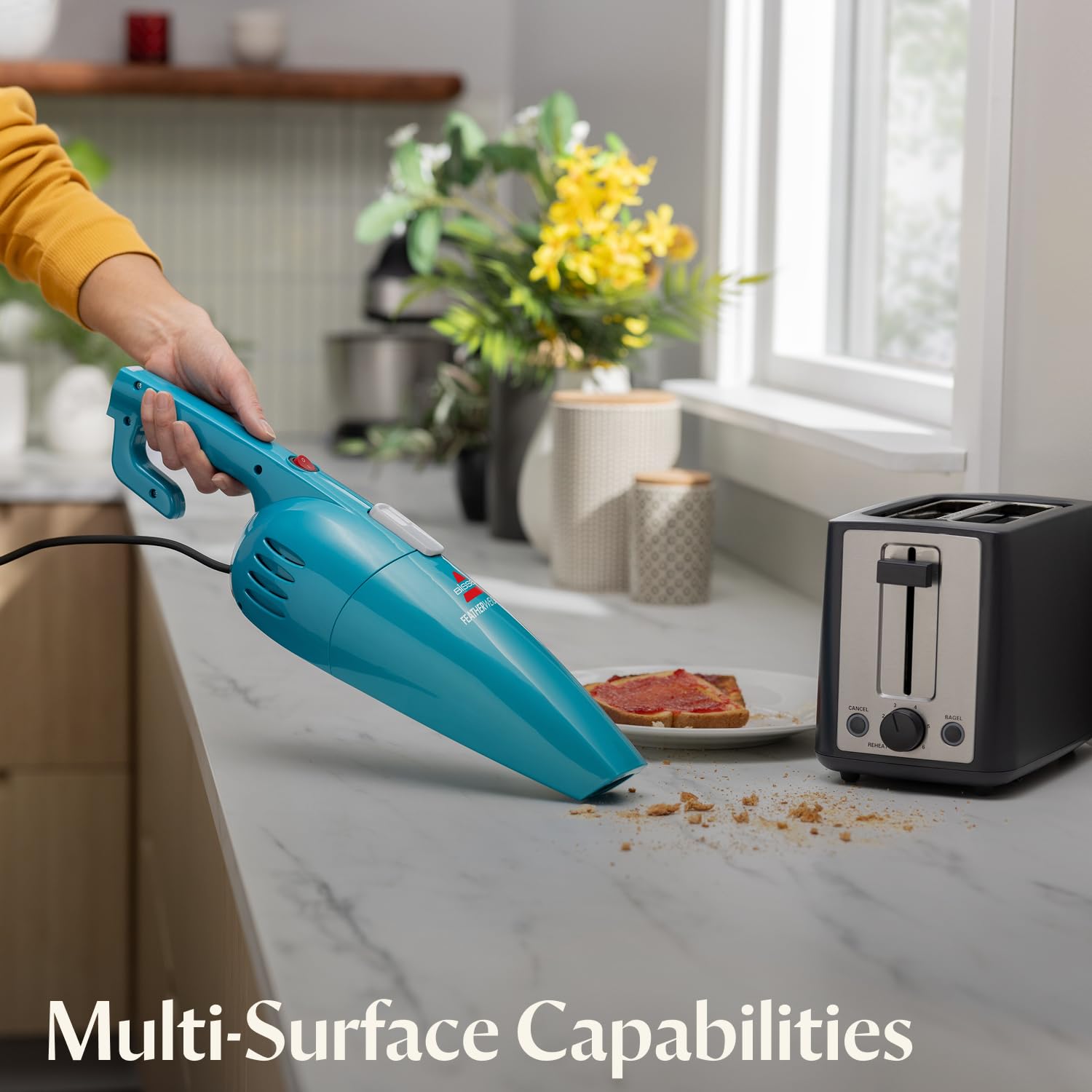 Bissell Featherweight 0.67-liter dirt cup with clear view