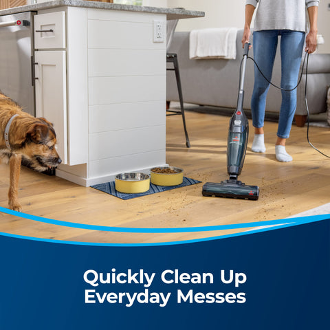 Bissell Featherweight PowerBrush quick-release handle enables stick-to-hand cleaning.