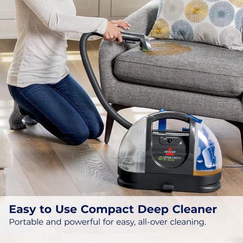 Bissell Little Green Pet Deluxe used for car interior cleaning on the go