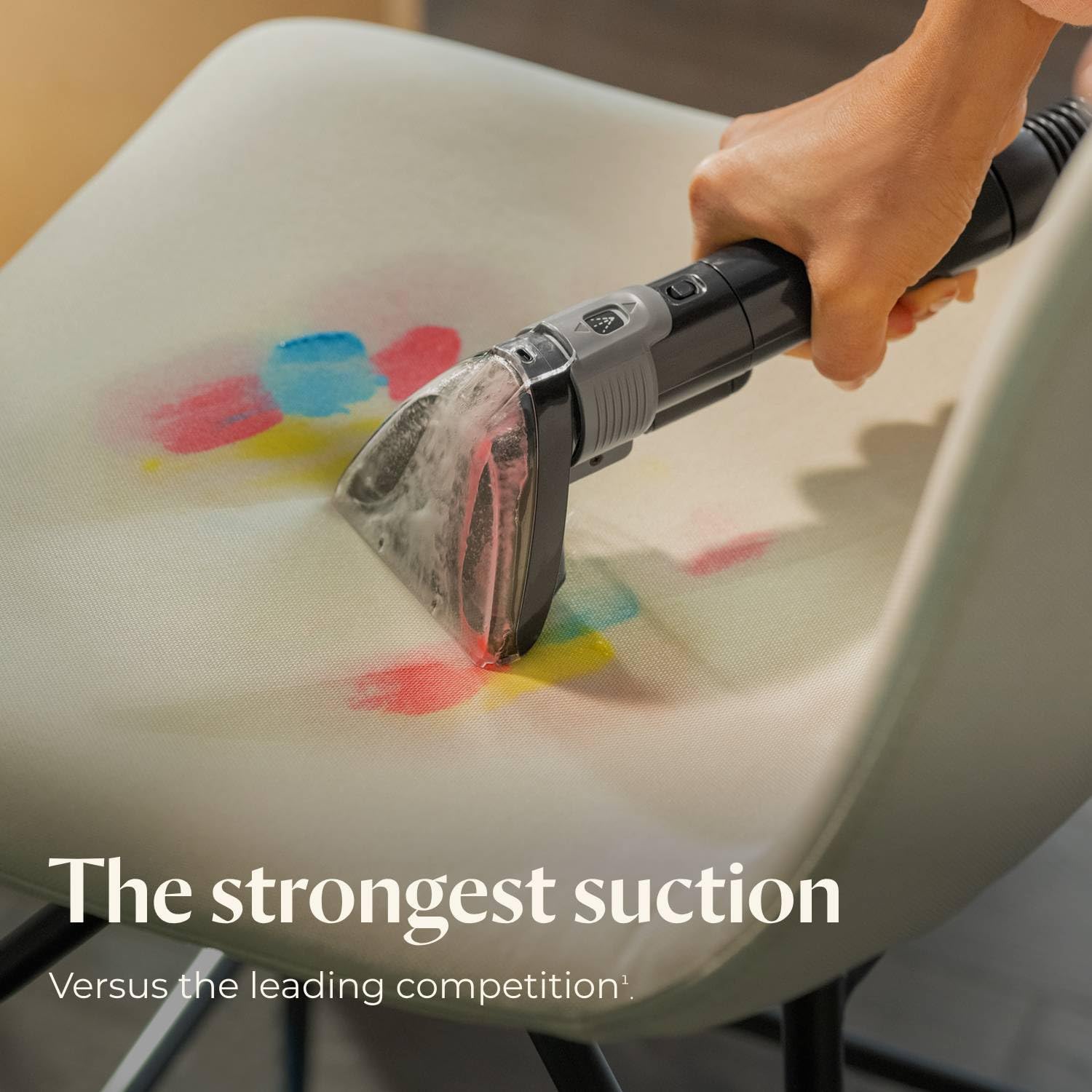 Bissell Little Green Pet Pro in action cleaning upholstery with deep power.