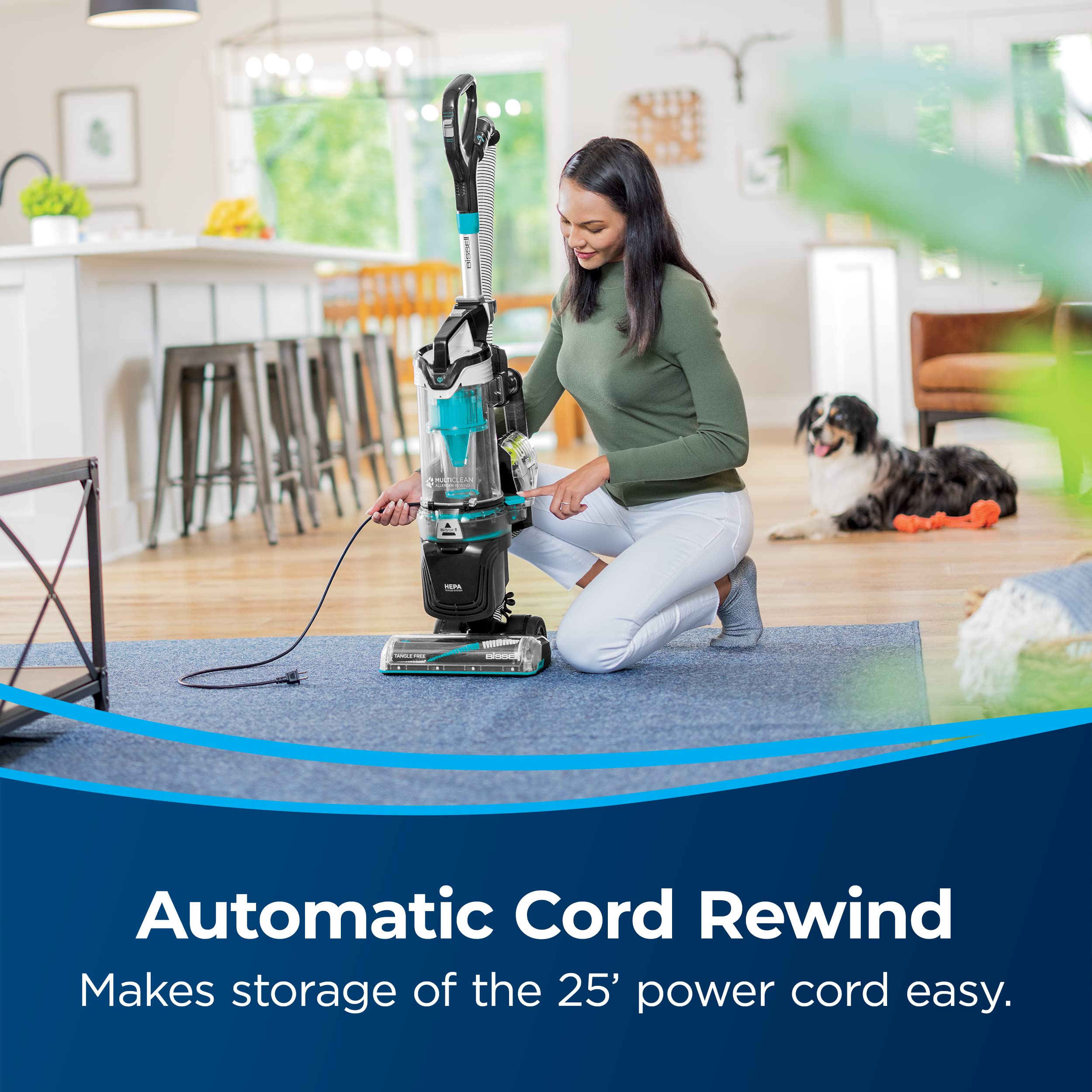 Bissell MultiClean Allergen Pet Rewind demonstrating automatic cord rewind for tidy storage
