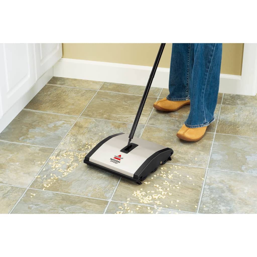 Bissell Natural Sweep edge brushes reaching corners for thorough edge cleaning