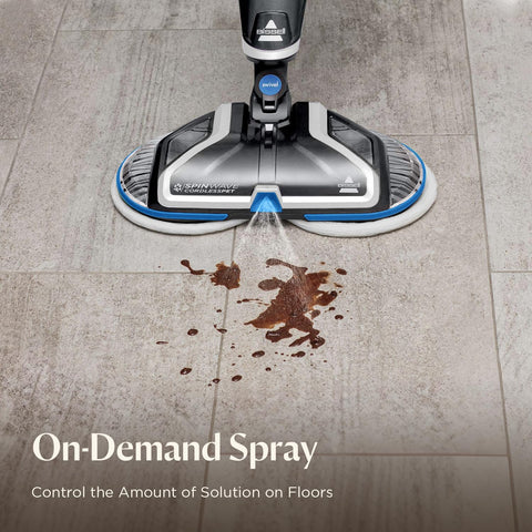 Bissell SpinWave on-demand spray for targeted stain removal.