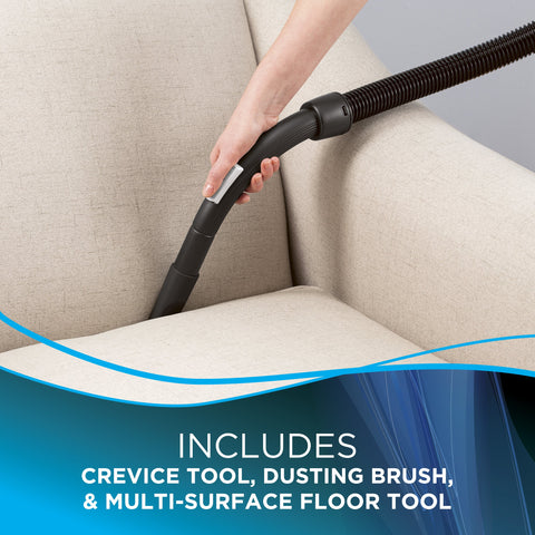 Bissell Zing bagged canister vacuum purple cord rewind for quick storage.
