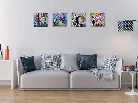 Biufo Banksy canvas wall art four‑piece set enhances a living room ambiance.