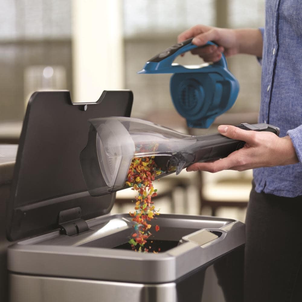 Flip-up brush cleans upholstery on furniture with ease.