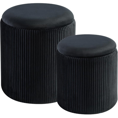 BLEXA round storage ottoman in black velvet with concealed space for essentials.