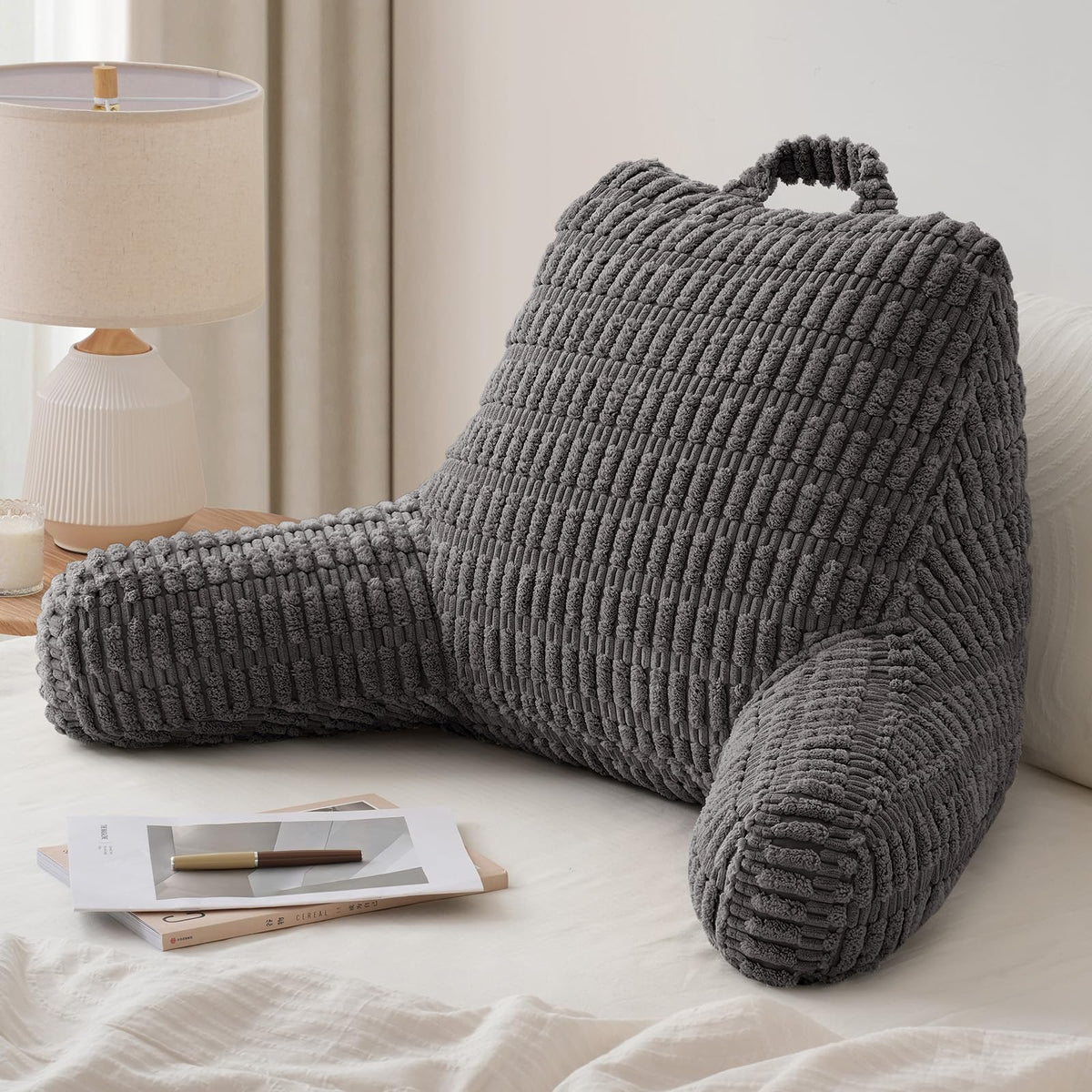 Blissful Diary reading pillow backrest with arms provides sturdy support for lounging.