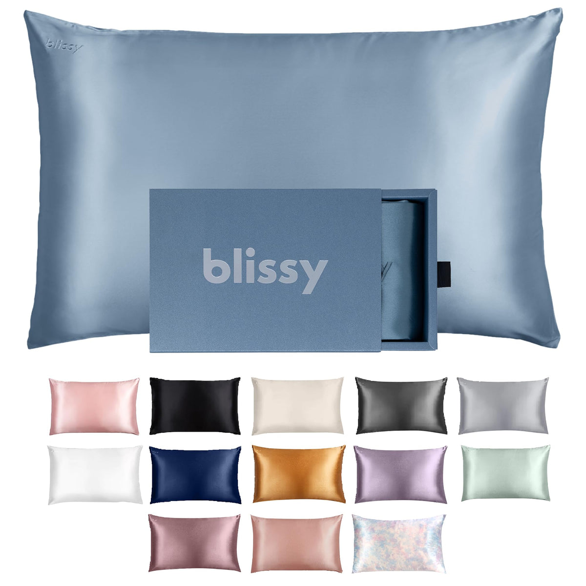 Blissy silk pillowcase ash blue king on bed, promoting smooth hair and balanced skin