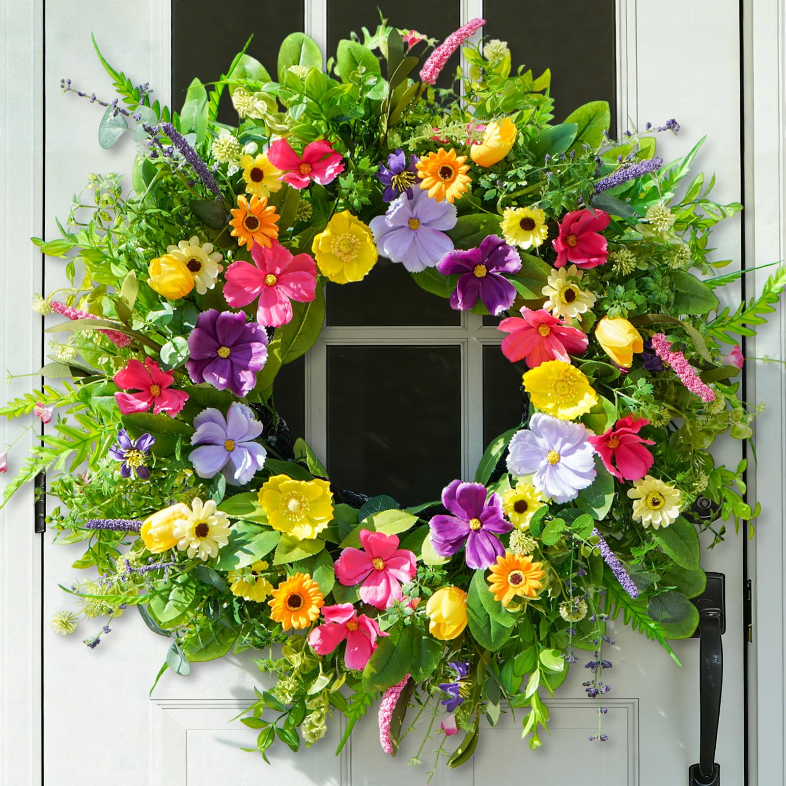 Bloeien 24-inch wreath on front door with meadow blooms to boost curb appeal.