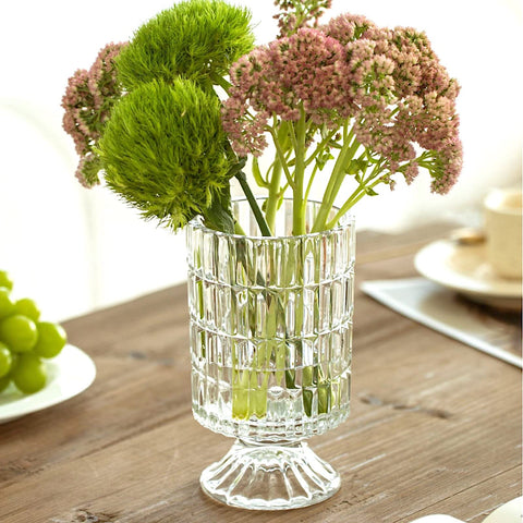 BLOFLO STU candle-ready vase adds ambient glow to your space.