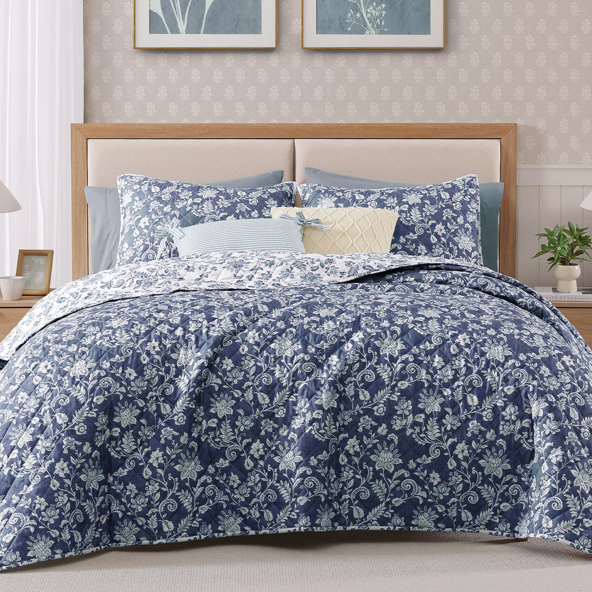 BLOOMHAVEN quilt set close-up shows durable stitching in oxford blue floral fabric.