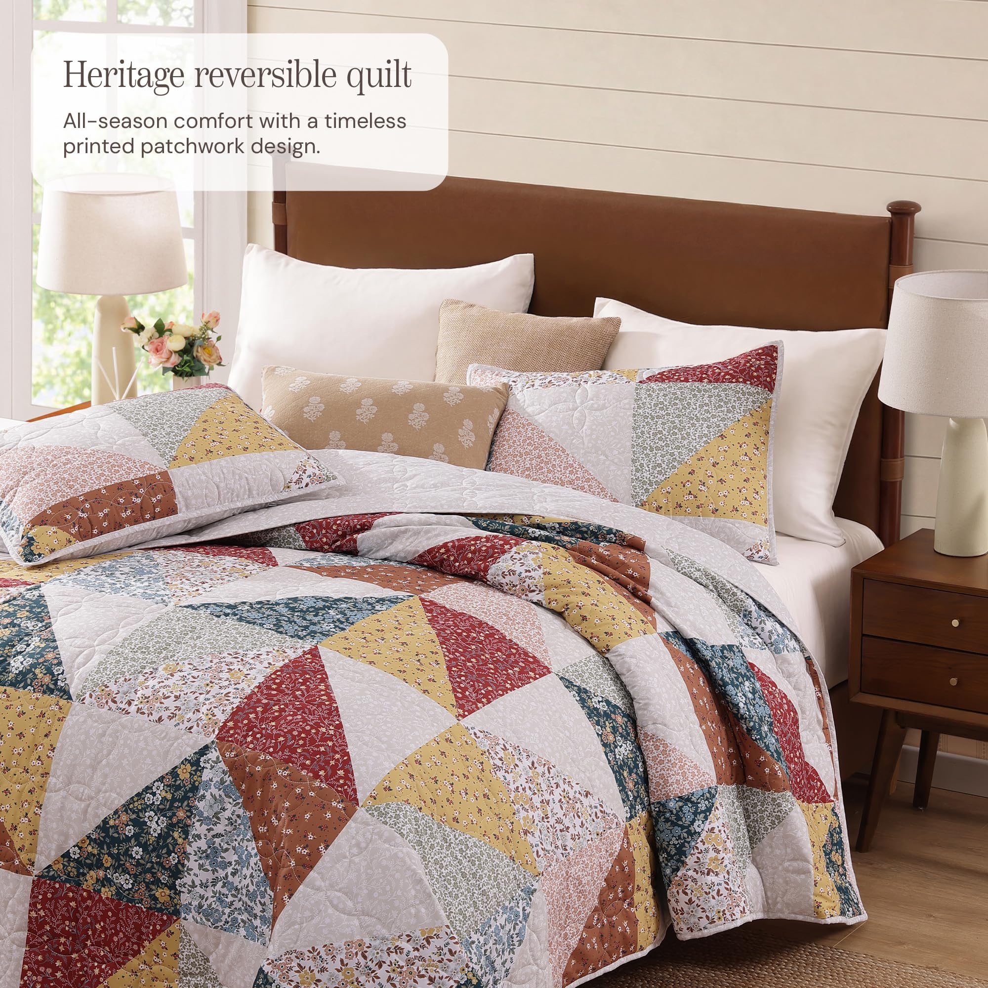 BLOOMHAVEN quilt set queen patchwork floral detail showcases vibrant color that lasts.