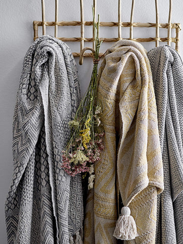 Bloomingville beige rattan wall hanger closeup-hooks highlights natural texture and sturdy design.