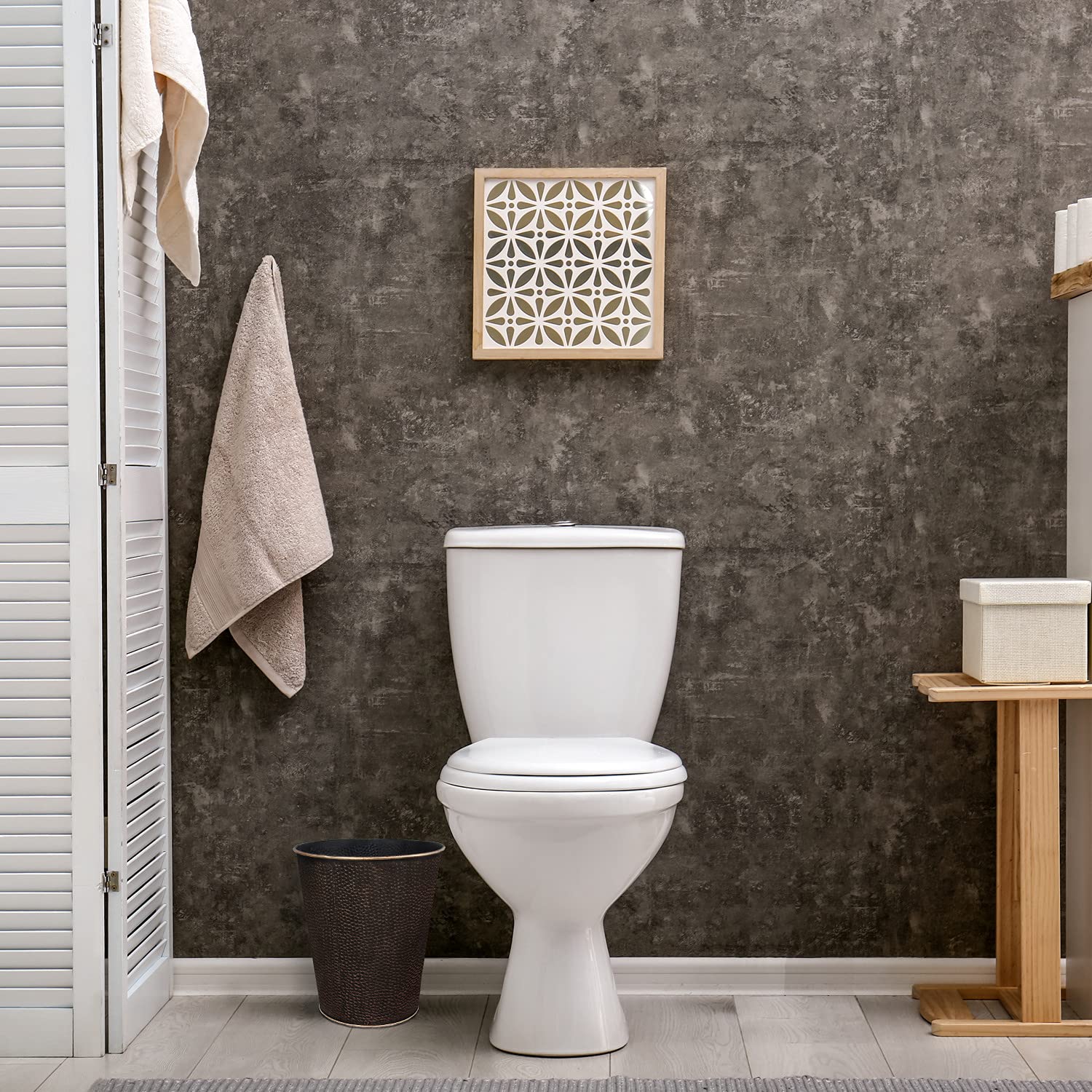 Blue Donuts wastebasket fits in corners with its 6-liter capacity.