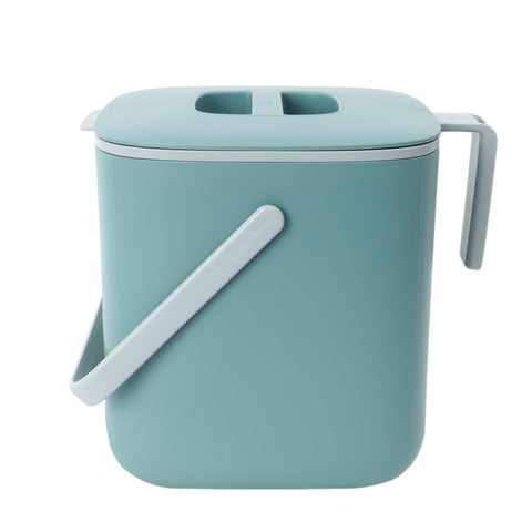 Blue Ginkgo kitchen compost bin lid seals tightly to keep odors contained on the counter.
