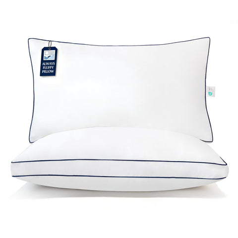 Blue Ridge Home Fashions hotel pillows king 2-pack on bed offering lasting shape and plush support.