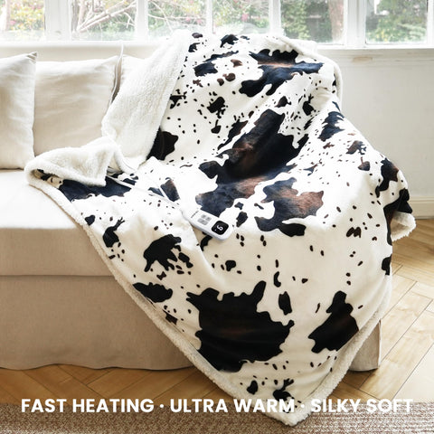 Blunique heated blanket draped on bed for instant warmth