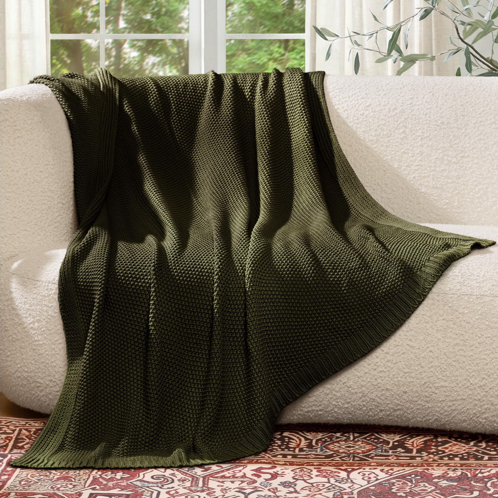 blunique throw folded on chair adding decorative warmth