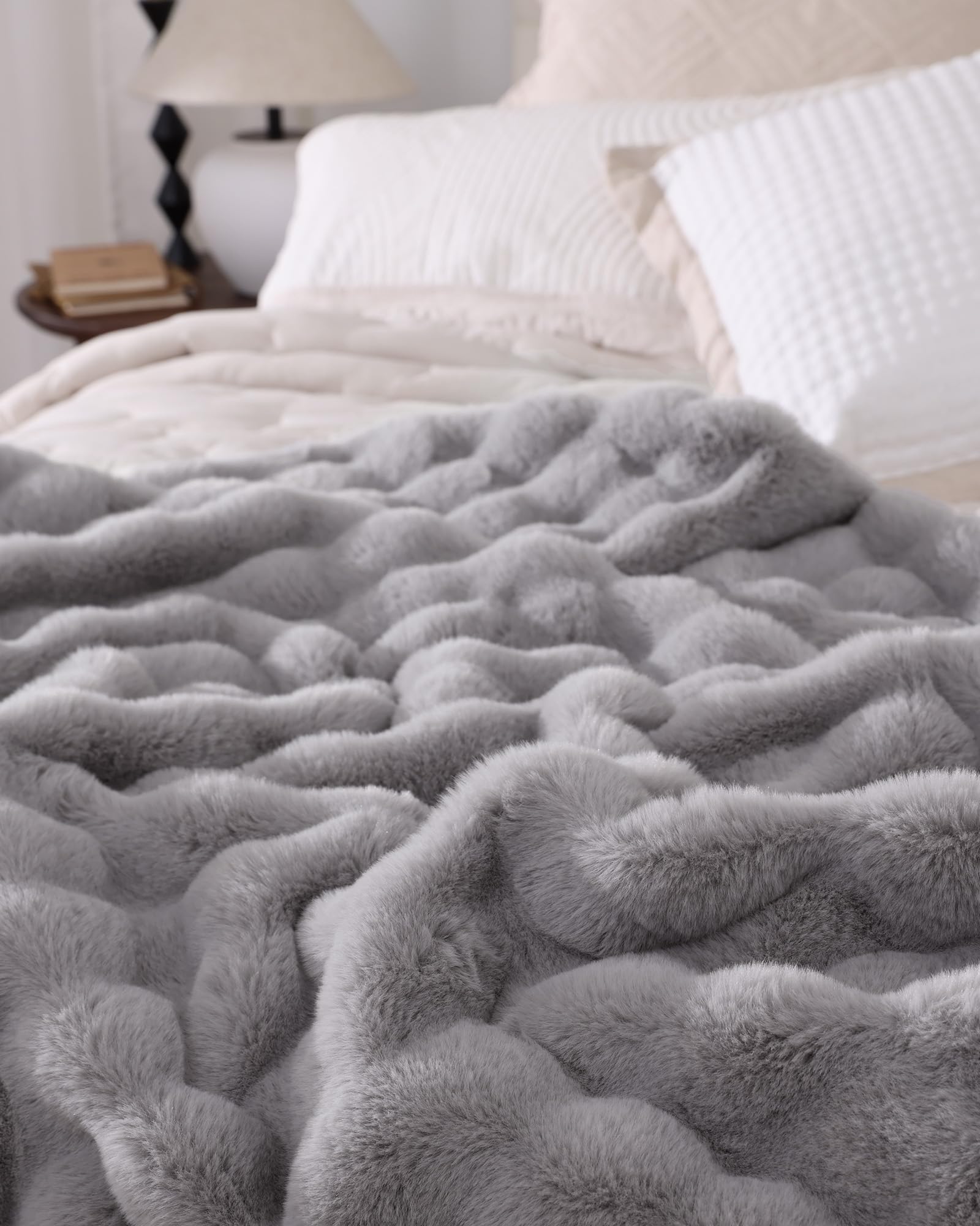 blunique Ultra Soft Cozy Faux Fur Throw ideal for dorm rooms or small spaces.