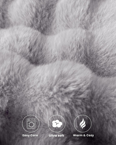 blunique Ultra Soft Cozy Faux Fur Throw neatly folded for storage.