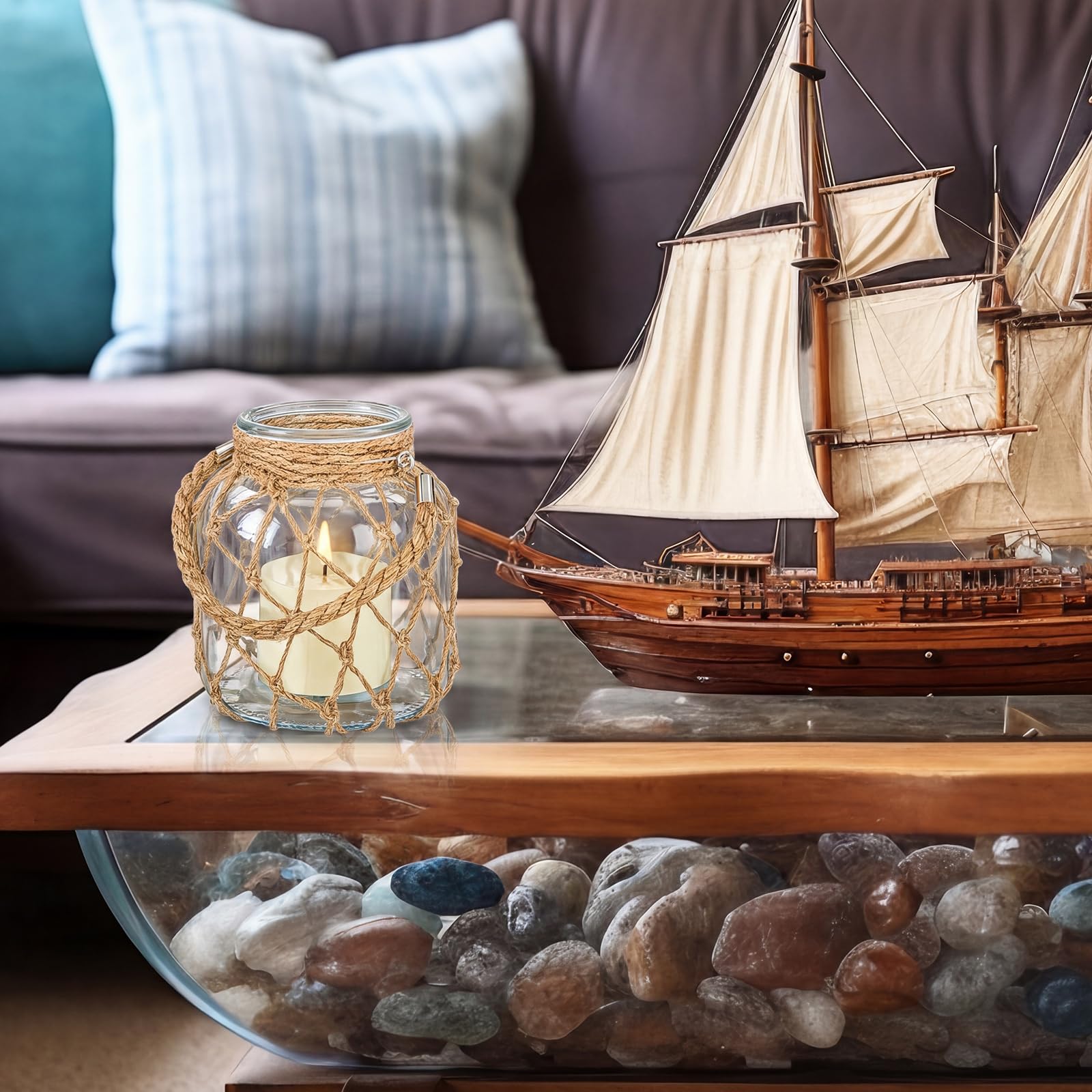 Blushtier rope-wrapped lanterns ideal as beach house centerpieces.