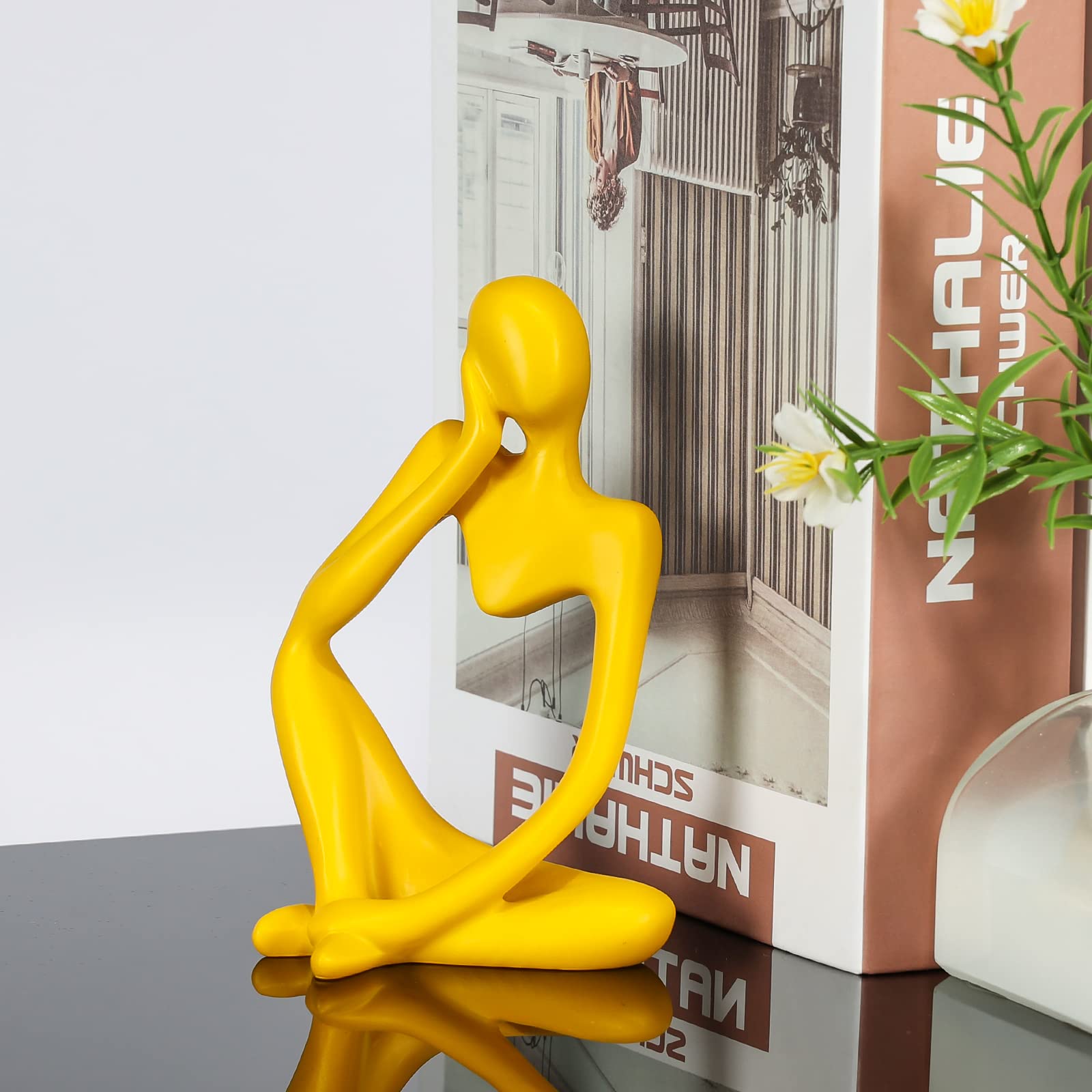 BMLCGJ Thinker statue stands as a collectible accent in any display.