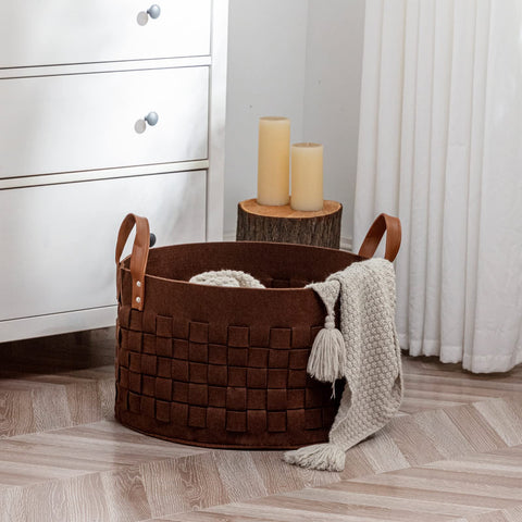 Boldmonkey leather-handled basket for easy, portable organization.