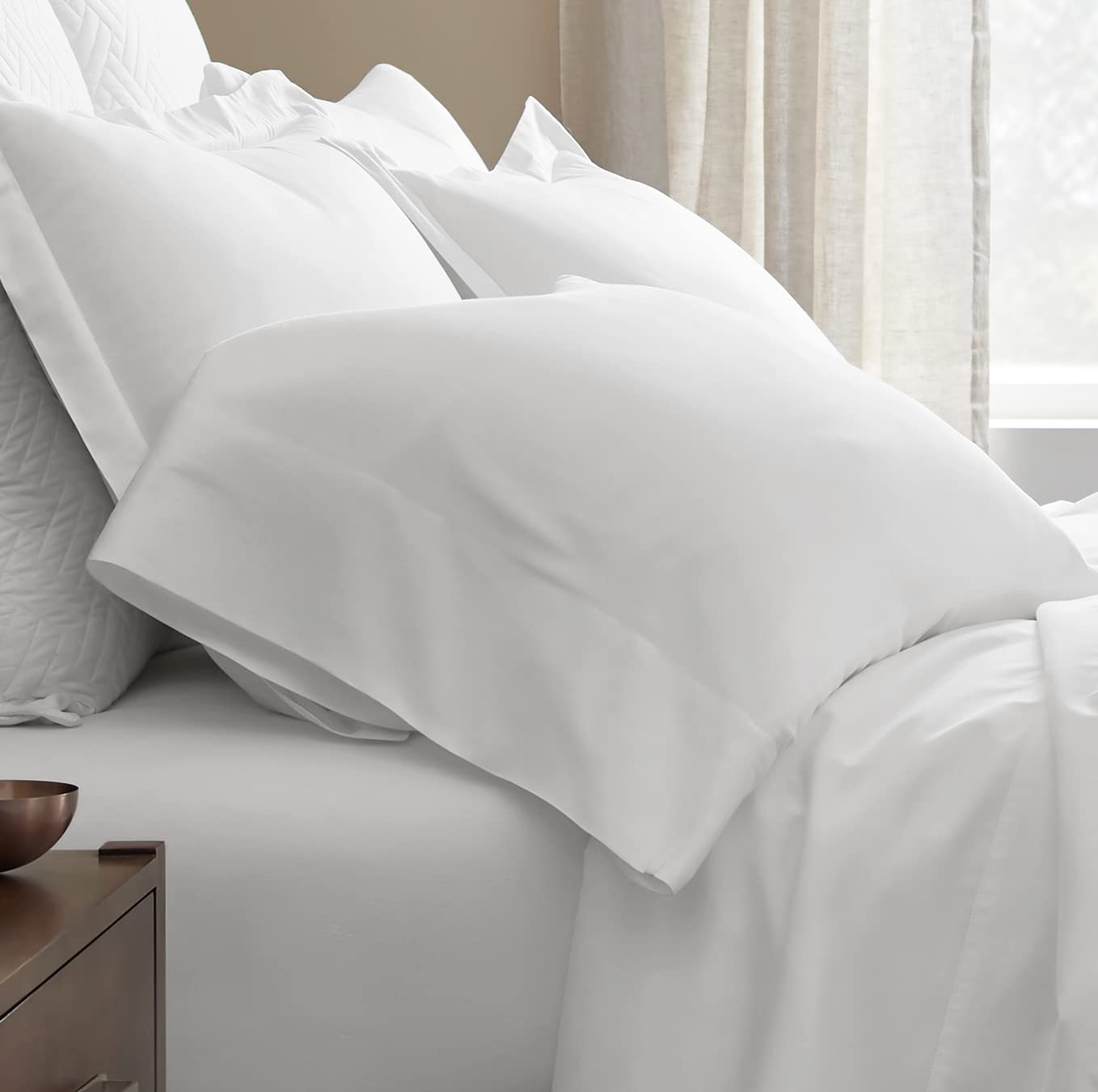 Boll & Branch standard white pillowcase close-up reveals soft texture and clean finish
