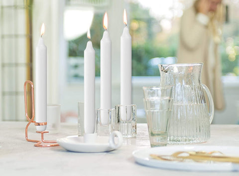 Bolsius candelabra-ready dining candles illuminate tables with spill-free glow