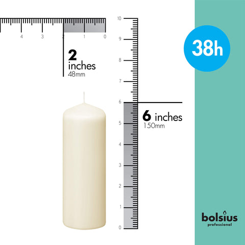 Bolsius Ivory pillar candles on a dinner table creating a refined centerpiece