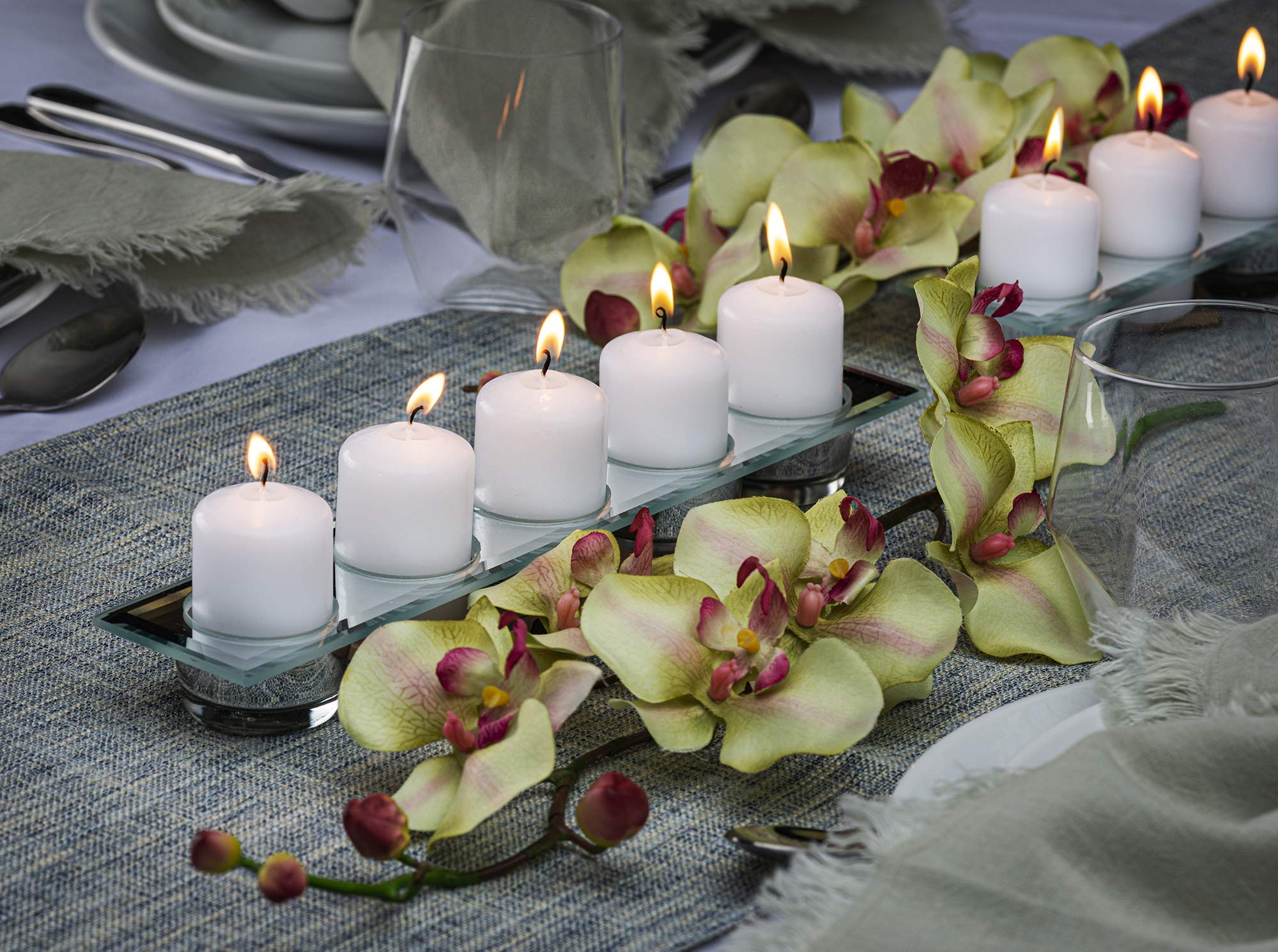 Bolsius white pillar centerpiece candle providing refined glow