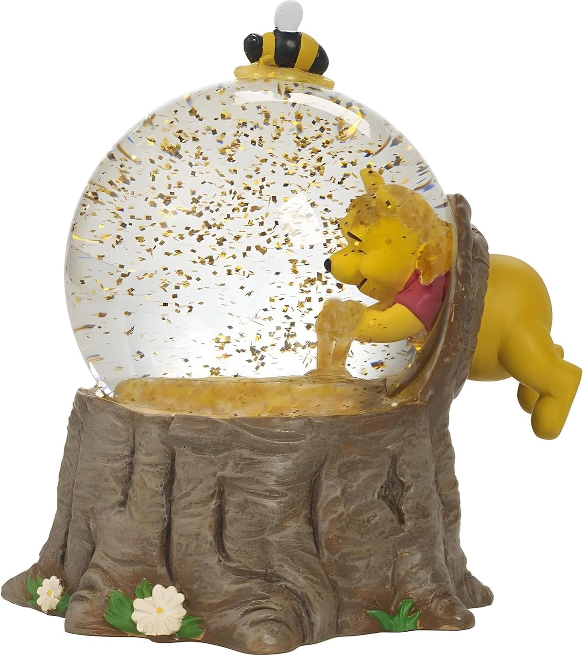 Boltcorrse Pooh Bear musical snow globe on a shelf showing the honey scene and glitter.