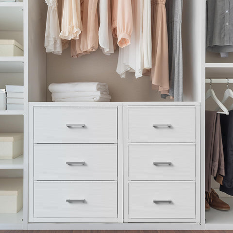 Boluo bedside-table arrangement proves practical storage beside the bed