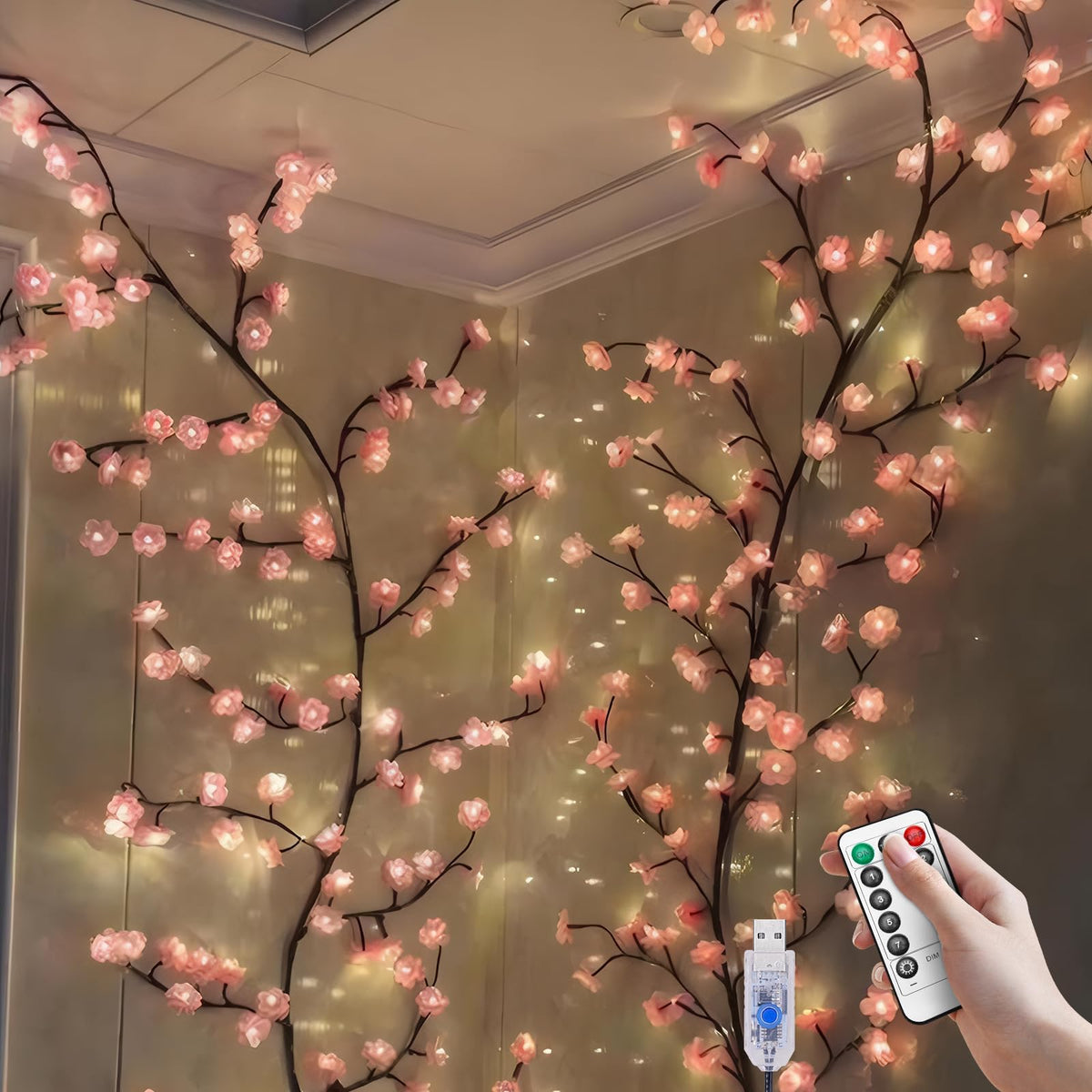 BomKra cherry LED tree branch on wall with 48 LEDs creating a soft romantic glow.