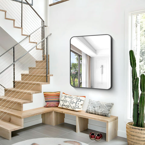 Bonewei black-frame rectangle mirror creates bold contrast in interior spaces