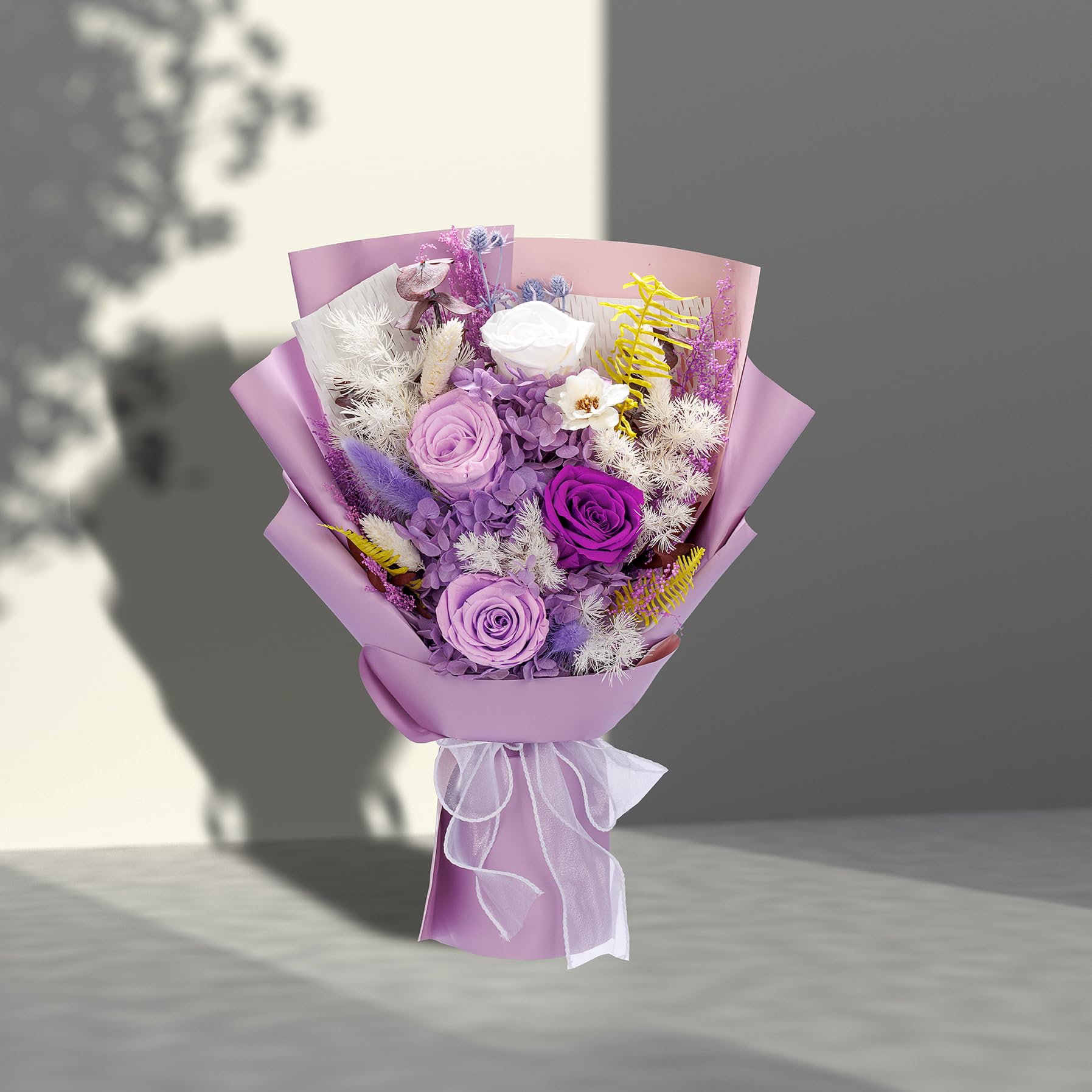 Bonsion framed preserved flowers serving as durable wall art.