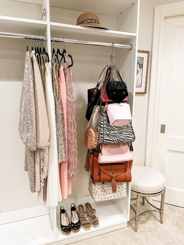 Six hooks per side maximize vertical purse storage.