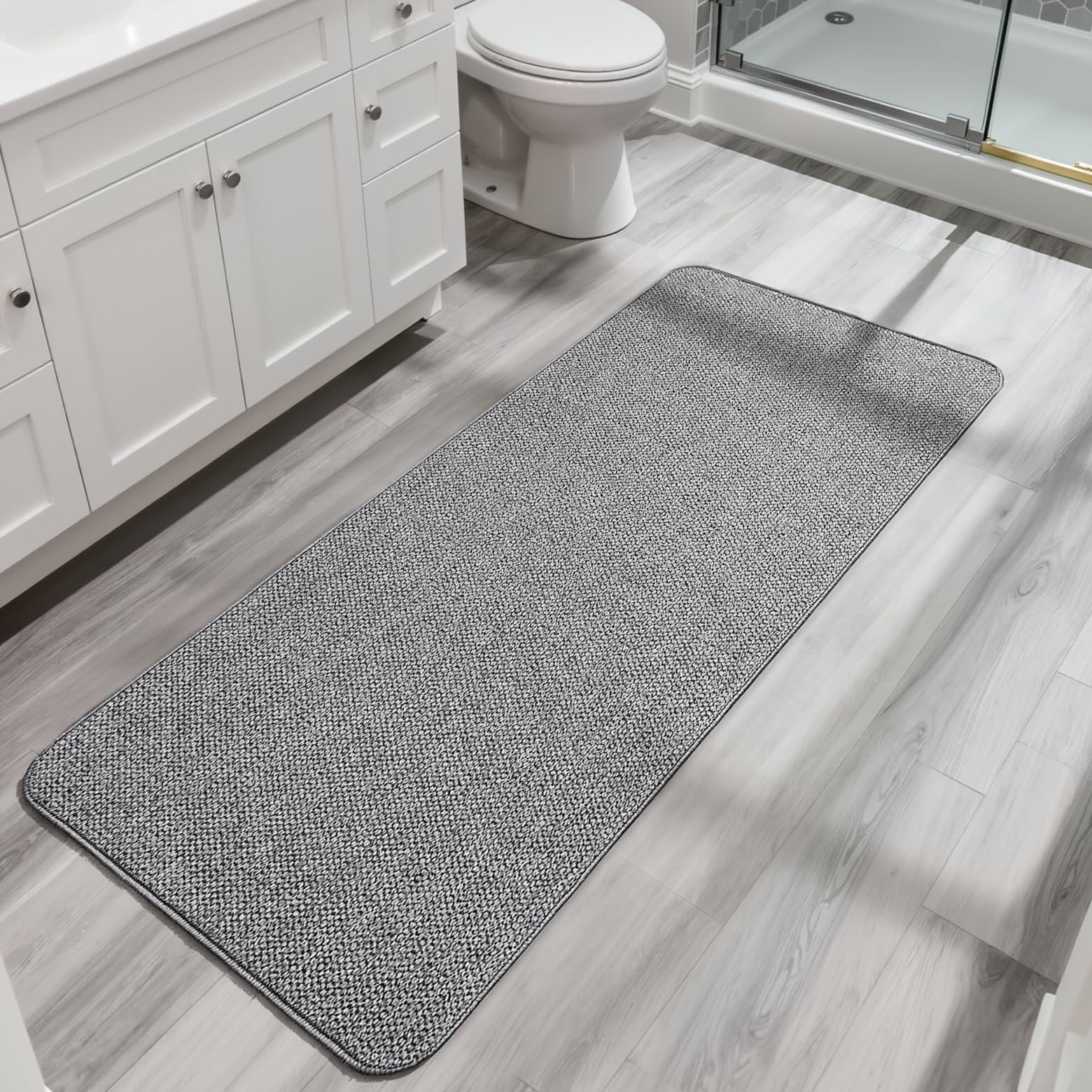 Bosap bath mat under door shows ultra-thin profile for seamless door clearance.