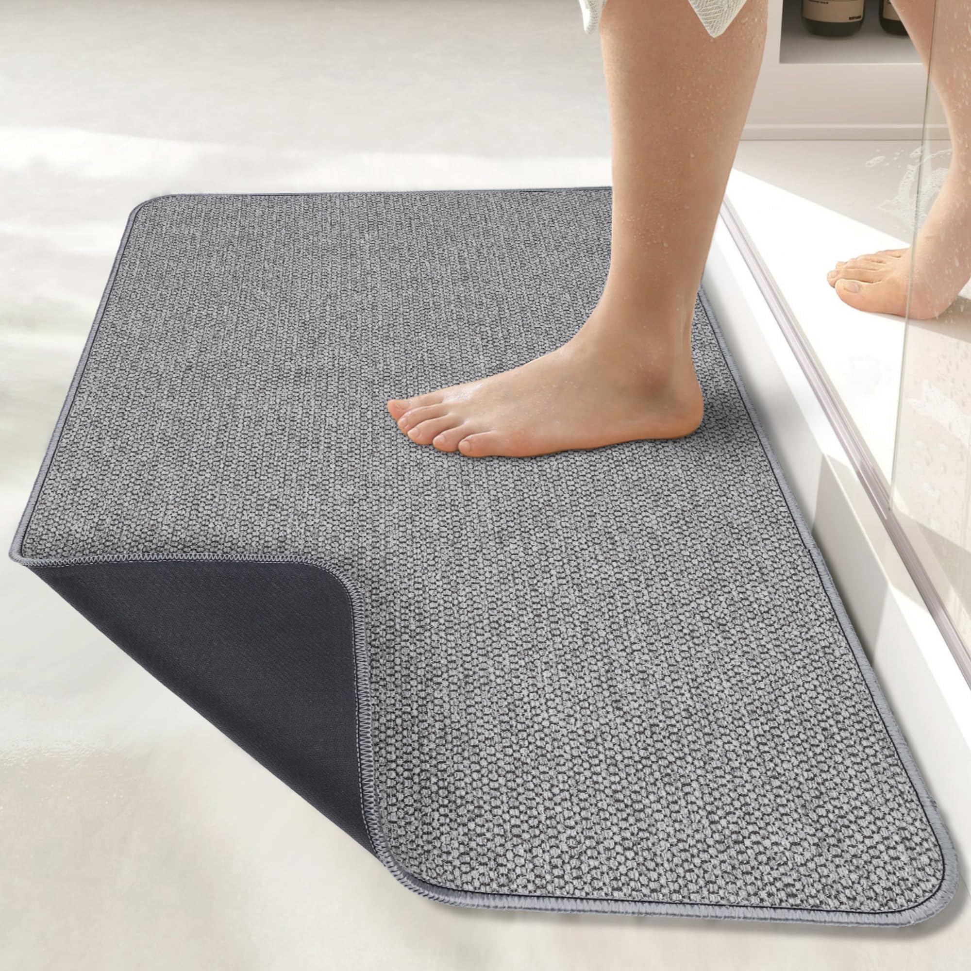 Bosap ultra-thin bath mat under door shows seamless fit