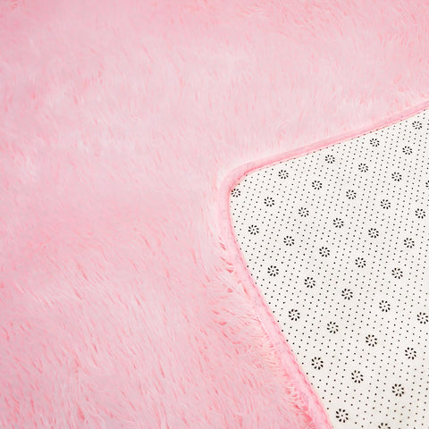 Boshengya pink shag rug being vacuumed for easy maintenance