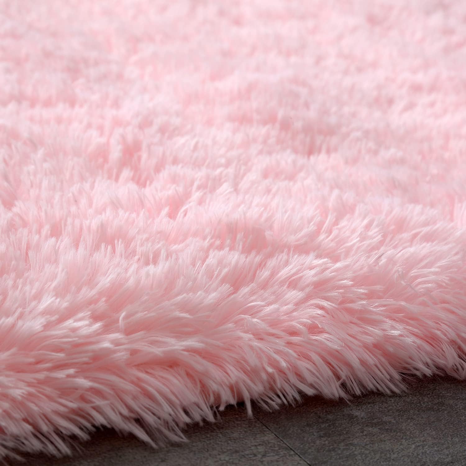 Boshengya pink shag rug beside a bed for cozy mornings and steps